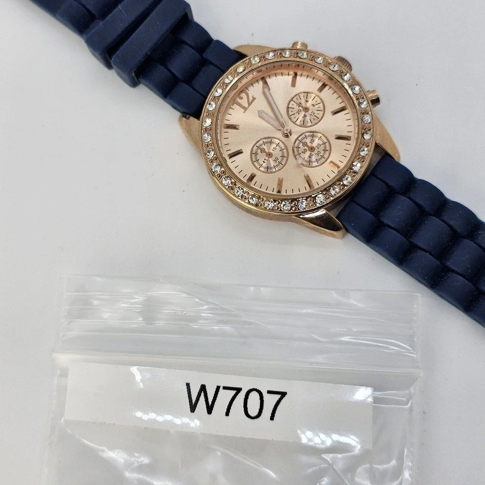 Women's Watch 38MM‎ Rose Gold Dial Crystal Bezel Blue Plastic Bands New Battery